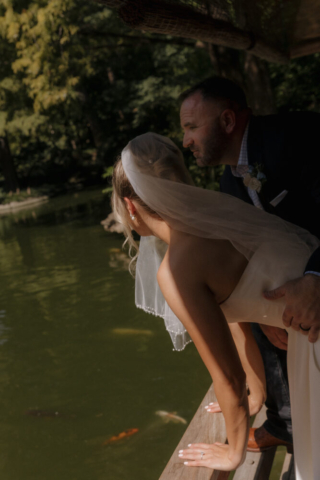 A young bride and groom at the Fort Worth Botanical Gardens on their intimate elopement wedding day in Fort Worth, Texas.