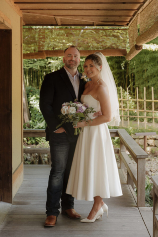 A young bride and groom at the Fort Worth Botanical Gardens on their intimate elopement wedding day in Fort Worth, Texas.