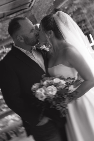 A young bride and groom at the Fort Worth Botanical Gardens on their intimate elopement wedding day in Fort Worth, Texas.