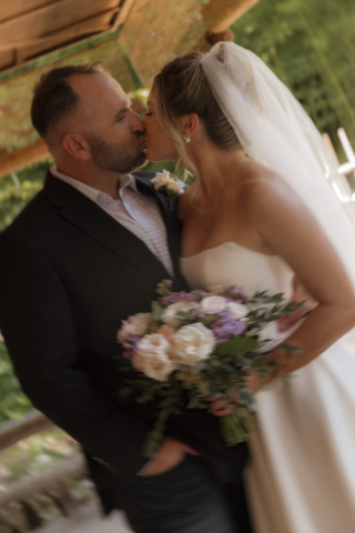 A young bride and groom at the Fort Worth Botanical Gardens on their intimate elopement wedding day in Fort Worth, Texas.