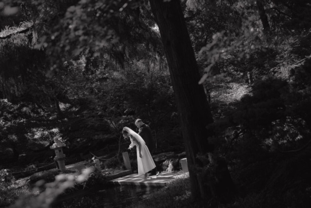 A young bride and groom at the Fort Worth Botanical Gardens on their intimate elopement wedding day in Fort Worth, Texas.