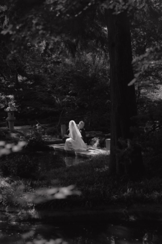 A young bride and groom at the Fort Worth Botanical Gardens on their intimate elopement wedding day in Fort Worth, Texas.