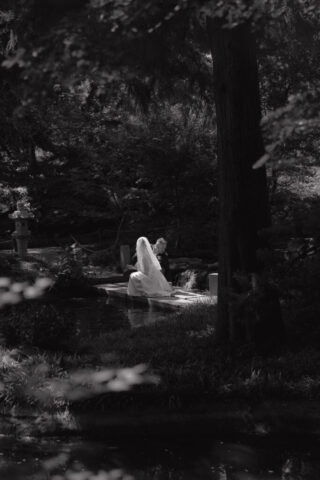 A young bride and groom at the Fort Worth Botanical Gardens on their intimate elopement wedding day in Fort Worth, Texas.