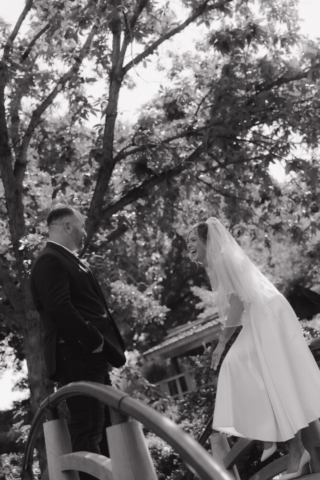 A young bride and groom at the Fort Worth Botanical Gardens on their intimate elopement wedding day in Fort Worth, Texas.