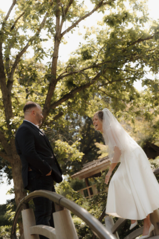 A young bride and groom at the Fort Worth Botanical Gardens on their intimate elopement wedding day in Fort Worth, Texas.