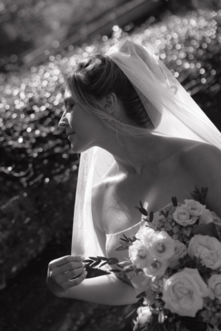 A young bride and groom at the Fort Worth Botanical Gardens on their intimate elopement wedding day in Fort Worth, Texas.