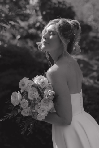 A young bride and groom at the Fort Worth Botanical Gardens on their intimate elopement wedding day in Fort Worth, Texas.