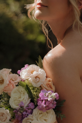 A young bride and groom at the Fort Worth Botanical Gardens on their intimate elopement wedding day in Fort Worth, Texas.