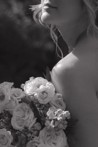 A young bride and groom at the Fort Worth Botanical Gardens on their intimate elopement wedding day in Fort Worth, Texas.