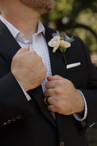 A young bride and groom at the Fort Worth Botanical Gardens on their intimate elopement wedding day in Fort Worth, Texas.