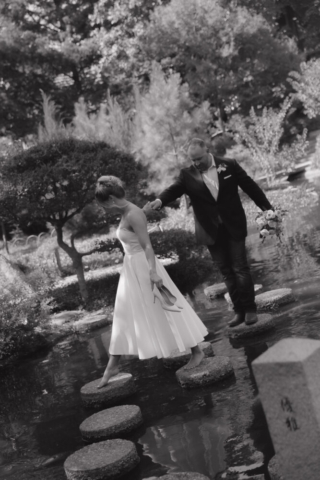 A young bride and groom at the Fort Worth Botanical Gardens on their intimate elopement wedding day in Fort Worth, Texas.