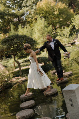 A young bride and groom at the Fort Worth Botanical Gardens on their intimate elopement wedding day in Fort Worth, Texas.