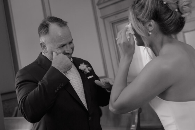 A young bride and groom at the Tarrant County Courthouse on their intimate elopement wedding day in Fort Worth, Texas.