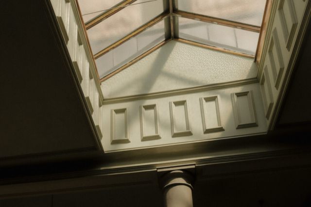 A young bride and groom at the Tarrant County Courthouse on their intimate elopement wedding day in Fort Worth, Texas.