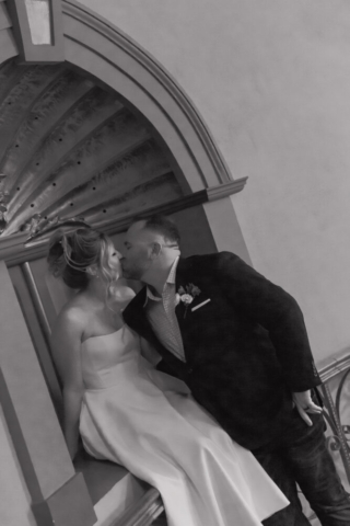 A young bride and groom at the Tarrant County Courthouse on their intimate elopement wedding day in Fort Worth, Texas.