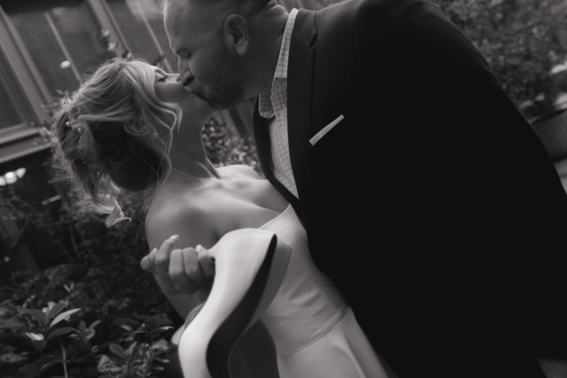 A young bride and groom at the Tarrant County Courthouse on their intimate elopement wedding day in Fort Worth, Texas.