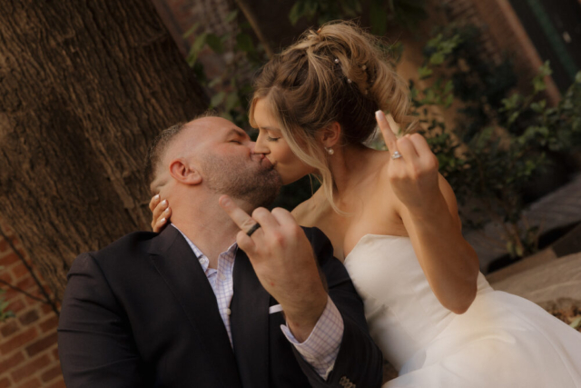 A young bride and groom at the Tarrant County Courthouse on their intimate elopement wedding day in Fort Worth, Texas.