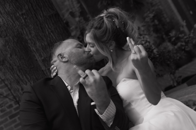 A young bride and groom at the Tarrant County Courthouse on their intimate elopement wedding day in Fort Worth, Texas.