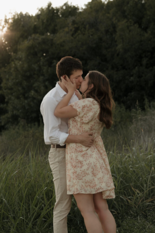 A young couple take their documentary and romantic engagement photos by a Texas DFW cinematic, moody, documentary style photographer.