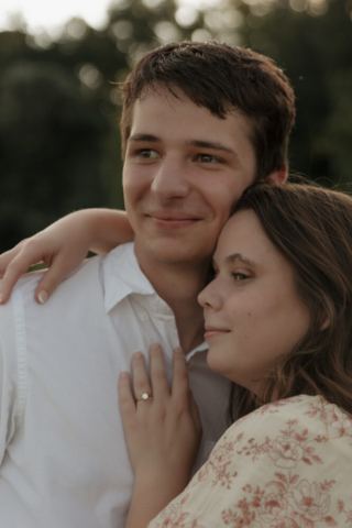 A young couple take their documentary and romantic engagement photos by a Texas DFW cinematic, moody, documentary style photographer.