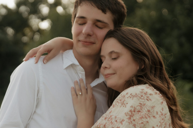 A young couple take their documentary and romantic engagement photos by a Texas DFW cinematic, moody, documentary style photographer.