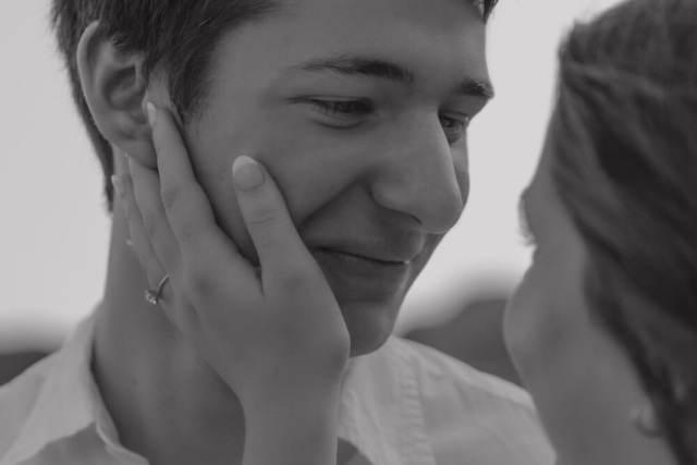 A young couple take their documentary and romantic engagement photos by a Texas DFW cinematic, moody, documentary style photographer.