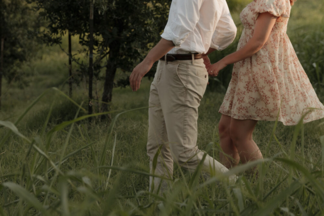 A young couple take their documentary and romantic engagement photos by a Texas DFW cinematic, moody, documentary style photographer.