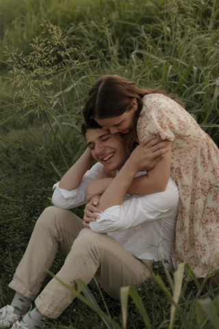 A young couple take their documentary and romantic engagement photos by a Texas DFW cinematic, moody, documentary style photographer.