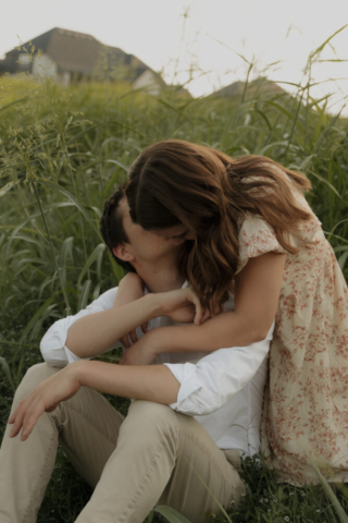 A young couple take their documentary and romantic engagement photos by a Texas DFW cinematic, moody, documentary style photographer.