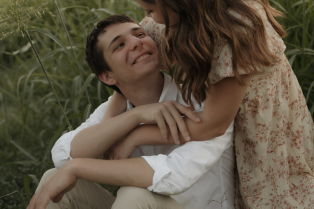 A young couple take their documentary and romantic engagement photos by a Texas DFW cinematic, moody, documentary style photographer.