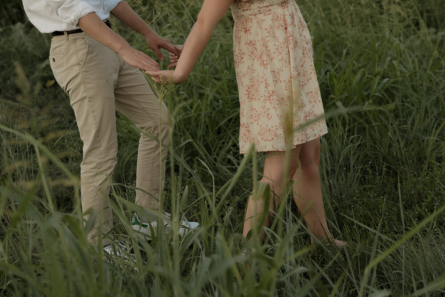 A young couple take their documentary and romantic engagement photos by a Texas DFW cinematic, moody, documentary style photographer.