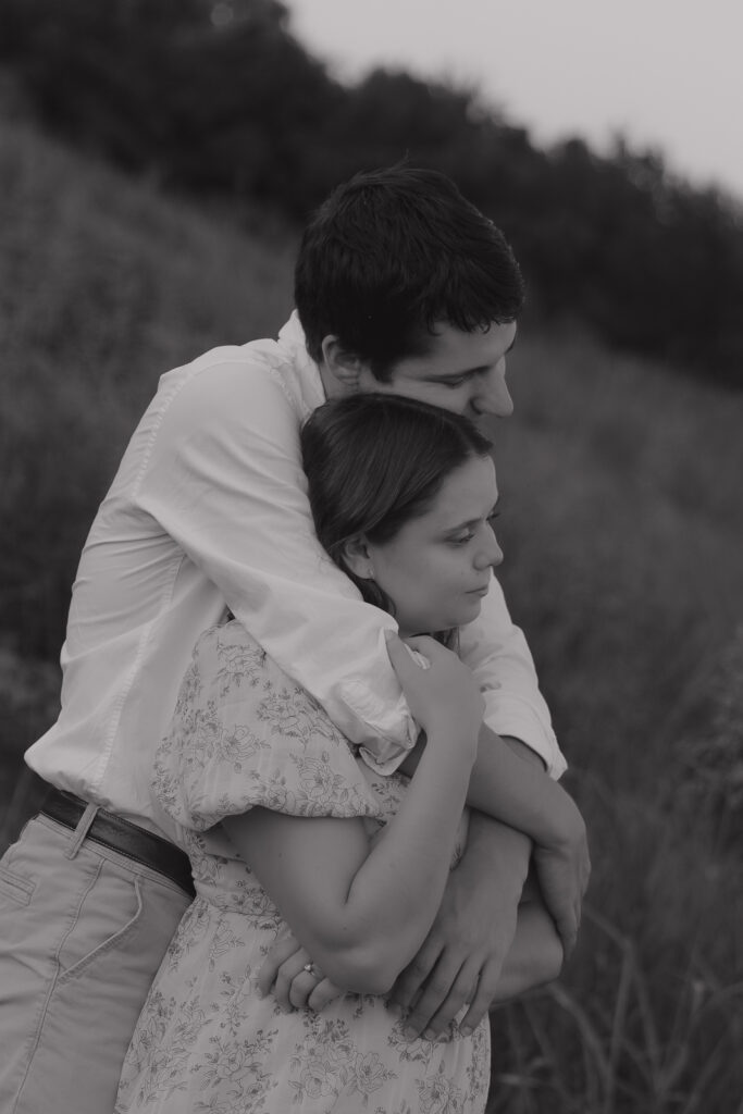 A young couple take their documentary and romantic engagement photos by a Texas DFW cinematic, moody, documentary style photographer.
