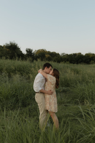 A young couple take their documentary and romantic engagement photos by a Texas DFW cinematic, moody, documentary style photographer.