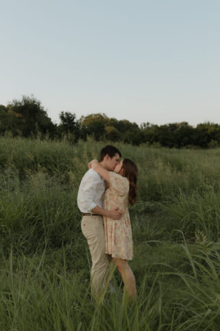A young couple take their documentary and romantic engagement photos by a Texas DFW cinematic, moody, documentary style photographer.
