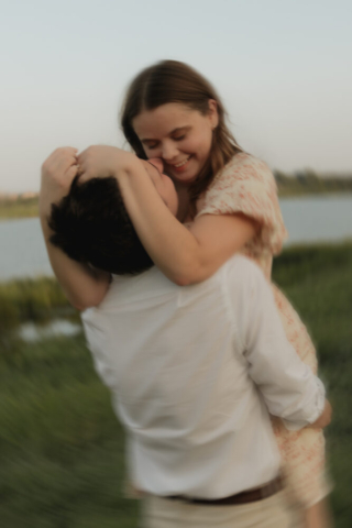 A young couple take their documentary and romantic engagement photos by a Texas DFW cinematic, moody, documentary style photographer.