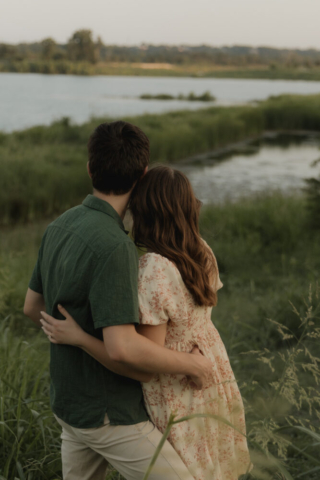 A young couple take their documentary and romantic engagement photos by a Texas DFW cinematic, moody, documentary style photographer.