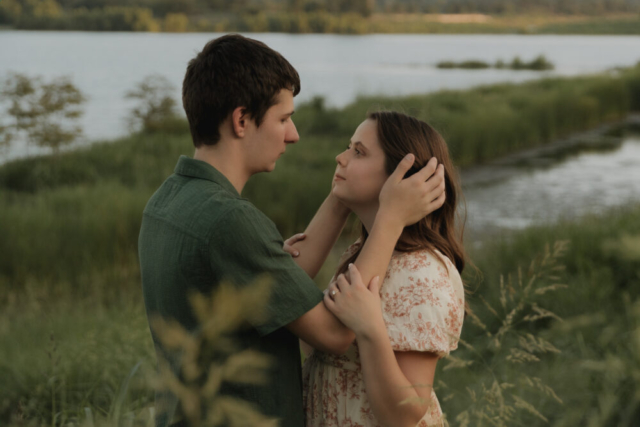 A young couple take their documentary and romantic engagement photos by a Texas DFW cinematic, moody, documentary style photographer.