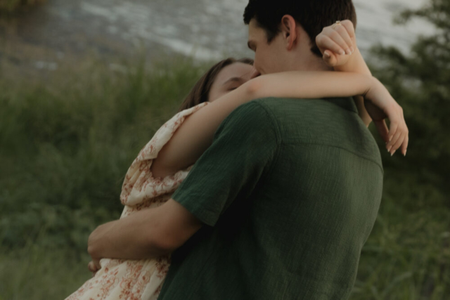 A young couple take their documentary and romantic engagement photos by a Texas DFW cinematic, moody, documentary style photographer.