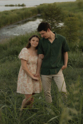 A young couple take their documentary and romantic engagement photos by a Texas DFW cinematic, moody, documentary style photographer.