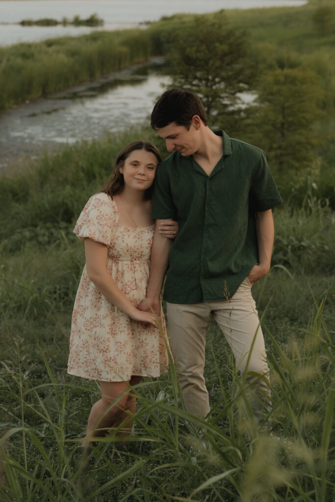 A young couple take their documentary and romantic engagement photos by a Texas DFW cinematic, moody, documentary style photographer.