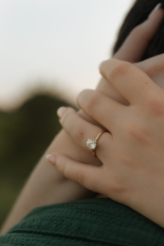 A young couple take their documentary and romantic engagement photos by a Texas DFW cinematic, moody, documentary style photographer.