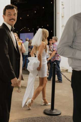 Hannah-Lylene-Dallas-Fort-Worth-Photographer-0197 A bride and groom have a candid documentary elopement wedding ceremony in Dallas, Texas, followed by modern classy bridal portraits and candid photos while interacting with their reception guests.