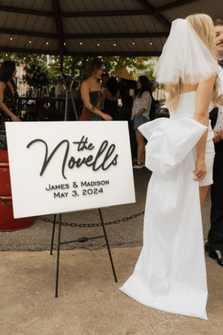 A bride and groom have a candid documentary elopement wedding ceremony in Dallas, Texas, followed by modern classy bridal portraits and candid photos while interacting with their reception guests.