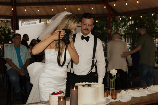 A bride and groom have a candid documentary elopement wedding ceremony in Dallas, Texas, followed by modern classy bridal portraits and candid photos while interacting with their reception guests.