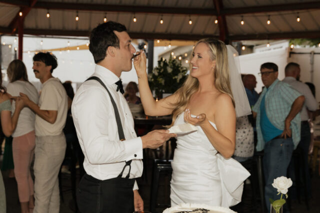 Hannah-Lylene-Dallas-Fort-Worth-Photographer-0506 A bride and groom have a candid documentary elopement wedding ceremony in Dallas, Texas, followed by modern classy bridal portraits and candid photos while interacting with their reception guests.