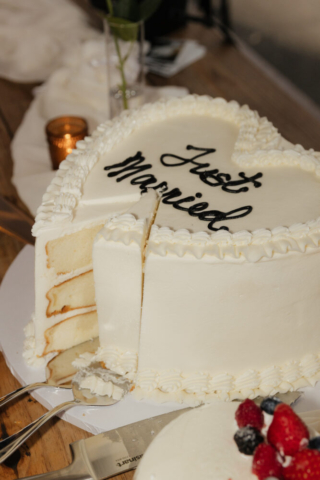 A bride and groom have a candid documentary elopement wedding ceremony in Dallas, Texas, followed by modern classy bridal portraits and candid photos while interacting with their reception guests.