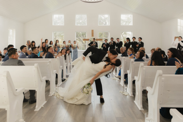 A bride and groom have a candid documentary elopement wedding ceremony in Houston, Texas at the Addison Woods Wedding Venue followed by modern classy bridal portraits and candid photos while interacting with their reception guests.