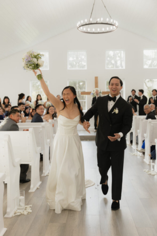 A bride and groom have a candid documentary elopement wedding ceremony in Houston, Texas at the Addison Woods Wedding Venue followed by modern classy bridal portraits and candid photos while interacting with their reception guests.