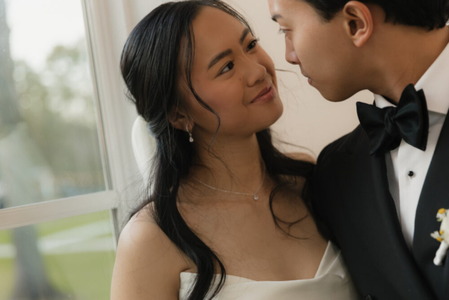 A bride and groom have a candid documentary elopement wedding ceremony in Houston, Texas at the Addison Woods Wedding Venue followed by modern classy bridal portraits and candid photos while interacting with their reception guests.