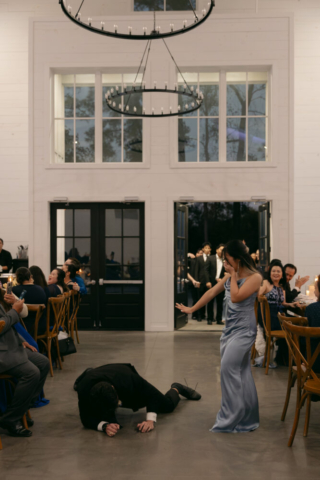 A bride and groom have a candid documentary elopement wedding ceremony in Houston, Texas at the Addison Woods Wedding Venue followed by modern classy bridal portraits and candid photos while interacting with their reception guests.